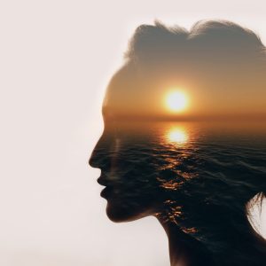 Image of sunrise in woman